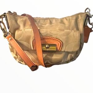 21. Coach Shoulder/Crossbody bag